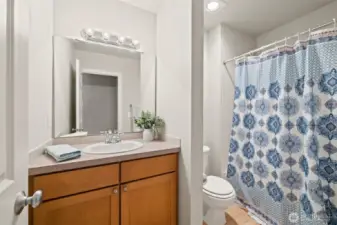 Full bathroom next to 2nd bedroom.