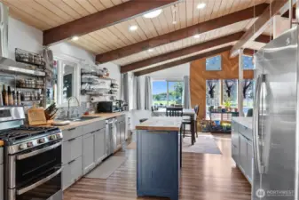 The kitchen has butcher block countertops, stainless steel appliances and so much more!