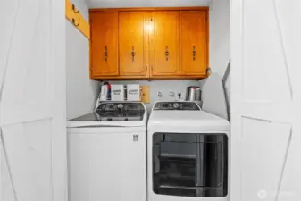 The main floor laundry area.  Washer and dryer do stay with the house.