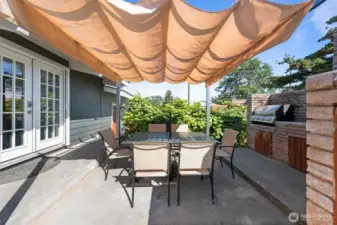 Enjoy the outdoor kitchen and fireplace year round.