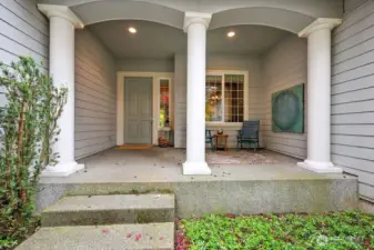 Step onto a charming front porch that sets the tone for this beautifully crafted, easy-living, single-level home.
