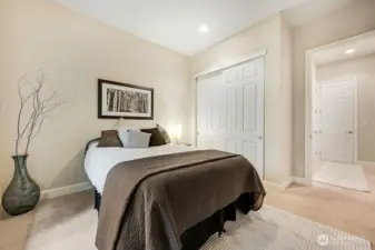 his cozy guest bedroom offers a welcoming retreat for friends or family, just steps from the guest bathroom for convenience. Its bright, comfortable layout makes it easy for visitors to feel right at home.