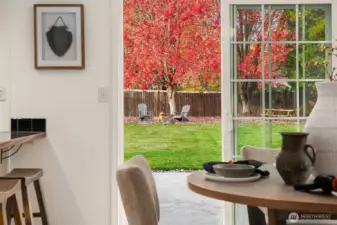 Slider off kitchen and dining allows seamless indoor/outdoor entertaining.