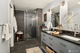 Fully permitted primary en-suite with dual vanity, all new lighting and fixtures, paint, spa-like finishes.