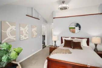 Primary suite features vaulted ceilings and high-end fan, french doors to patio where you can enjoy your morning coffee!