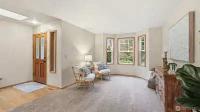 Formal living room with bay windows