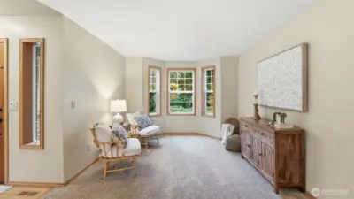 Formal living room with bay windows