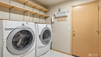 Utility room off the garage, washer and dryer are included.