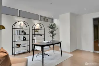 A large pocket door can close off the den/office so it can double as guest quarters.