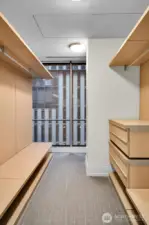 Primary bedroom walk-in closet.