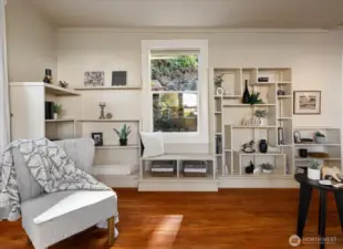 Custom built-ins add both charm and character, offering beautiful display space while anchoring the room with timeless style.