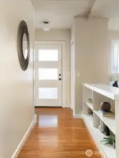 Step inside to warm wood floors and simple architectural details that set a welcoming tone the moment you enter.