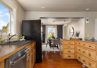 Open kitchen design flows easily to the dining room, creating a welcoming space for everyday living and entertaining.