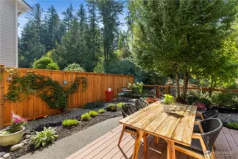 Beautifully landscaped back yard backs to a greenbelt for privacy.