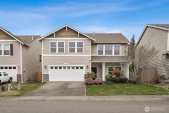 Welcome to this beautifully updated two-story in the wonderful Woodbriar Village community!