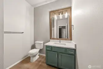 Three-quarter bath on the main (you can partially see the shower in the mirror).