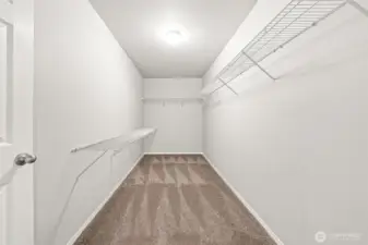 Place for all your clothes in the huge primary closet!
