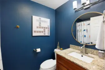 Full bath on upper level with luxurious cabinets.