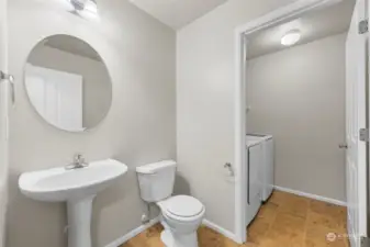 1/2 bath and laundry downstairs