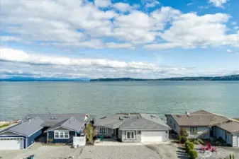 With seas of green and skies of blue, you'll love this beautiful home on the beach! Southern exposure & Western sunsets, the best of both can be had here.