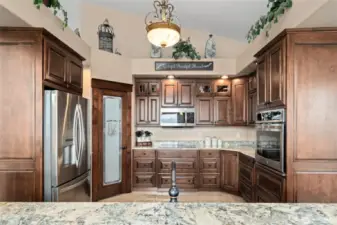 Gorgeous kitchen with custom made Alder cabinets.
