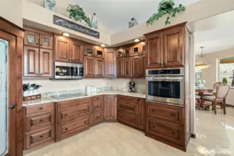 Another view of the kitchen, with breakfast nook to the right.