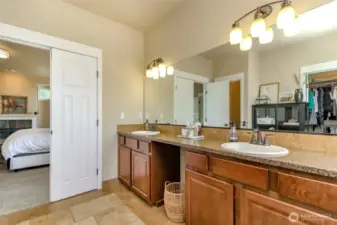 Convenient double sinks offer extra room in primary bathroom