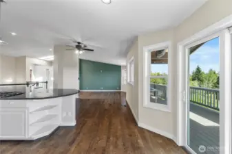 Dining nook with slider door to huge deck with fantastic views