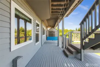 Downstairs deck area with porch swing