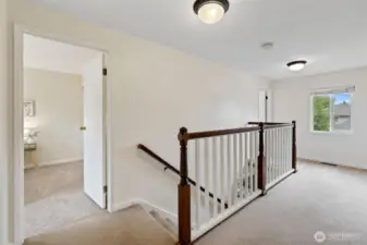 Head upstairs to the four bedrooms.