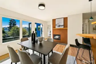 The dining area also has a gas fireplace, and direct access to the wonderful entertainment sized deck.