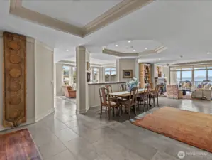 Open concept living with imported French stone tiles.
