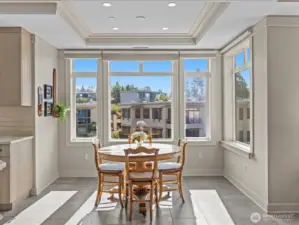 Kitchen eating space adjacent to the family room.