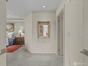 French doors opening into the spacious Primary bedroom and bathroom.