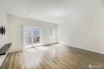 main level living area with deck