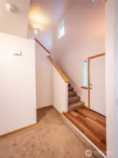 ENTRY AREA...COAT CLOSET UNDER STAIRWAY