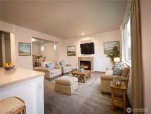 LIVING AREA WITH GAS FIREPLACE...DIGITALLY STAGED