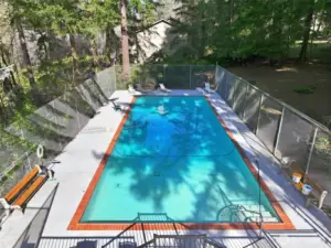 Heated pool just steps away from unit.