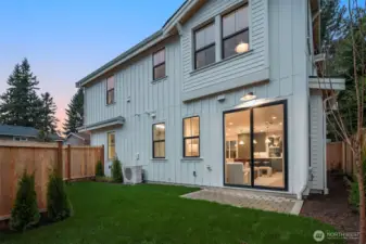 Fully fenced and landscaped yard.