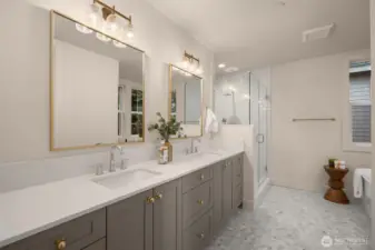 Heated floors + dual sinks.