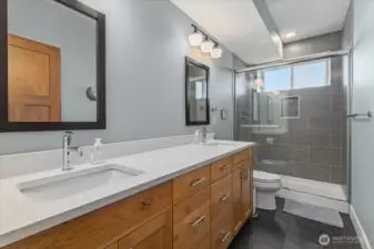 3/4 bathroom with double vanity
