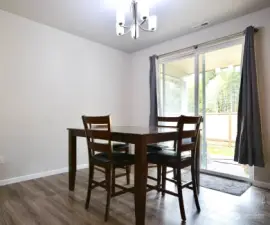 Dining room has large sliding glass door for easy access to the back patio