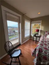 Corner windows flood the room with natural light.