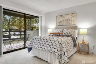Spacious second bedroom with direct access to the patio which can easily be used as an office if needed. This room has oversized sliding door for maximum natural light and direct access to the patio.