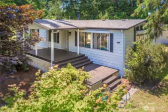 Newer roof, vinyl siding, and a freshly-painted, covered front deck make this one easy to maintain and ready for move-in.