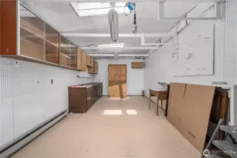 This shop has electric, heat, skylights, and insulated walls/ceilings.