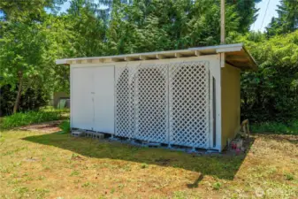 Another shed offering storage for your tools and wood for the woodstove.