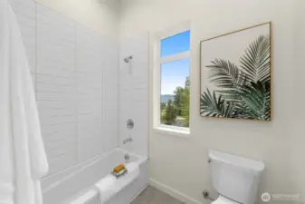 A serene bathroom setting with a view—everyday routines just got a major upgrade.