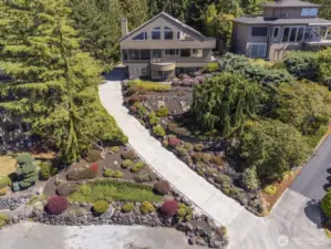 You benefit from the recently installed all concrete driveway which replaced the black top one.