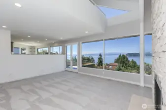 The ceiling is open to the office space is above. The kitchen is open to the living room.
